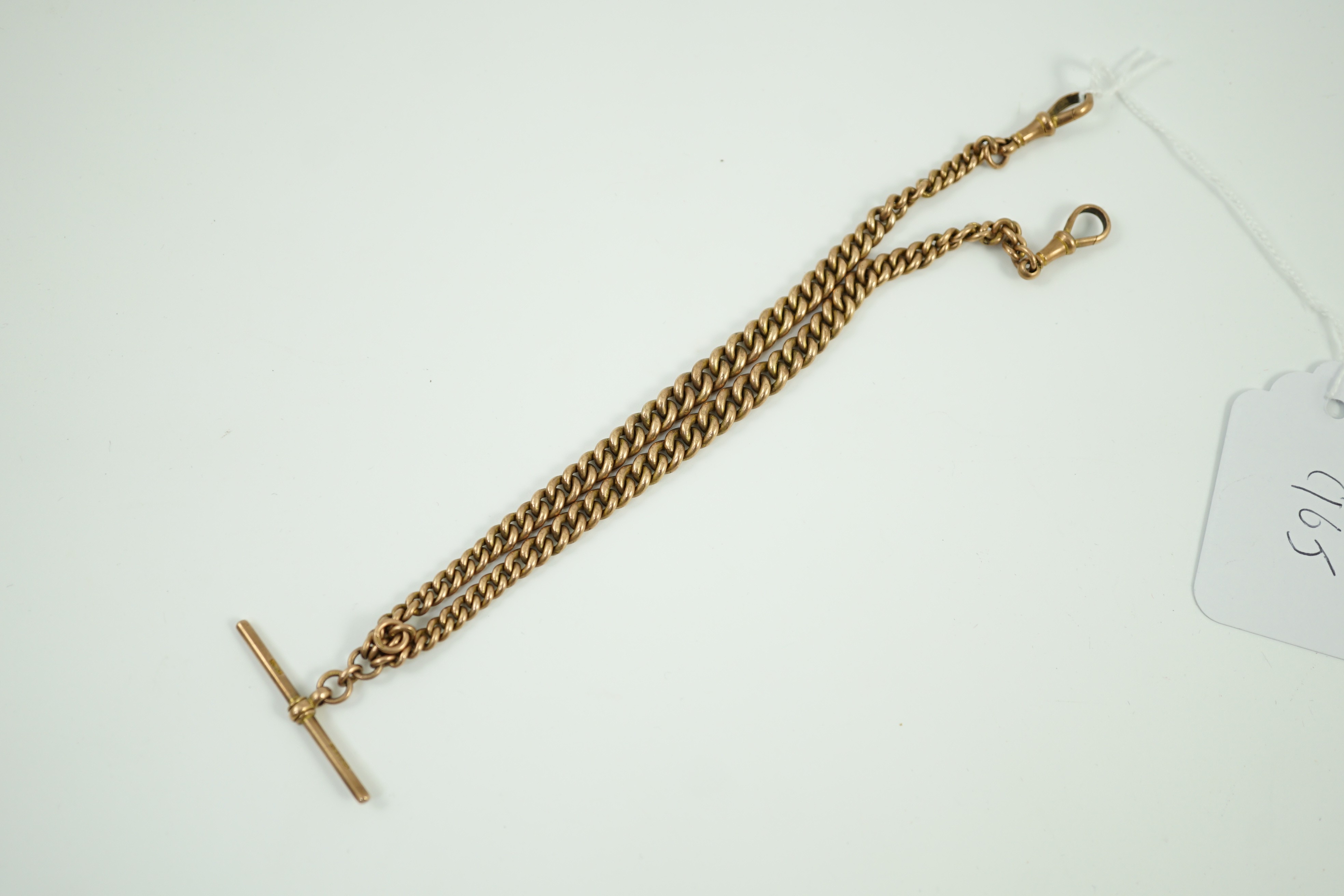 An early 20th century graduated 9ct gold curb link albert, 36cm, 39.7 grams.